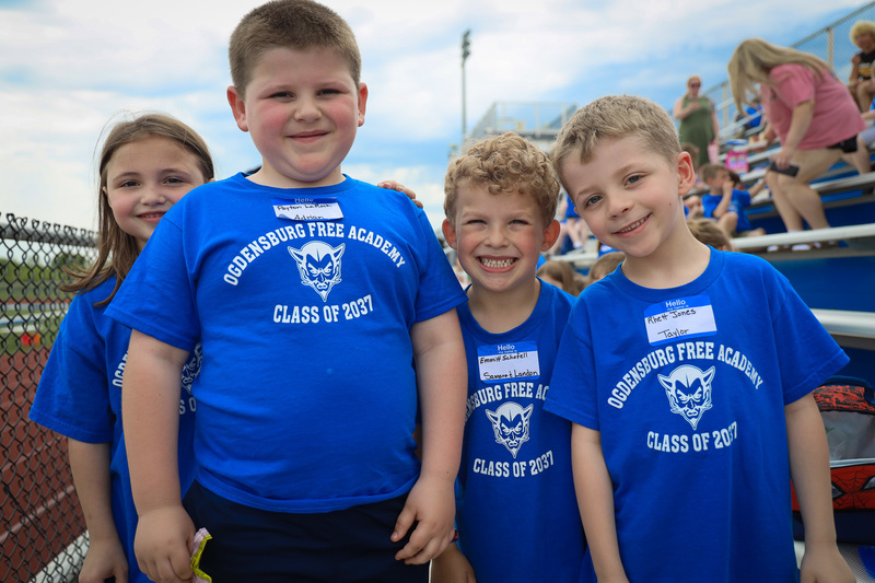 kindergarteners smile in group photo