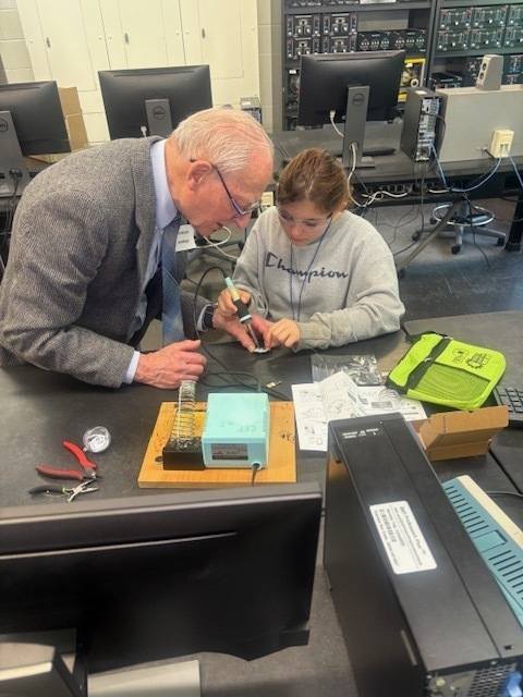 Professor and student work on project