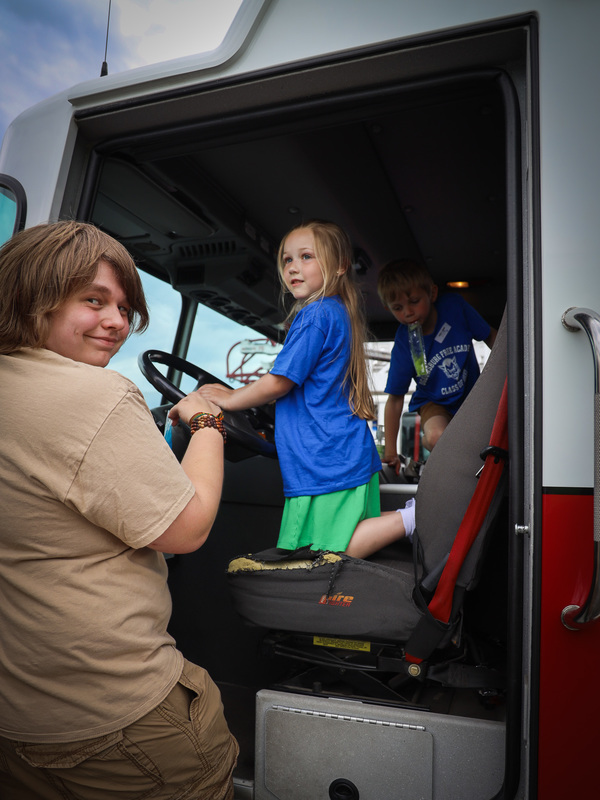 students checking out fire truck