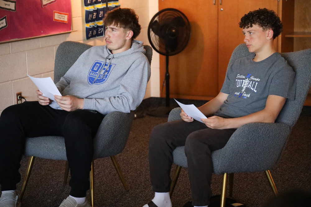 students sitting in chairs
